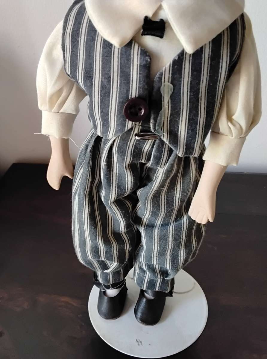 Pair of Vintage Porcelain Dolls on Stands