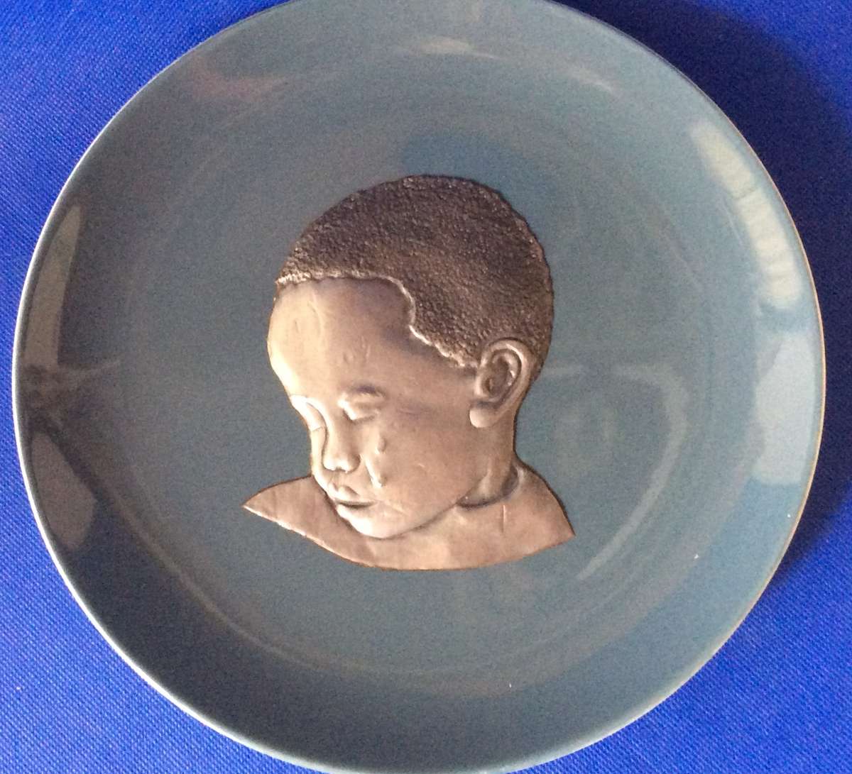 Metal Sheet Repousse Art on Poole Pottery Cameo plate