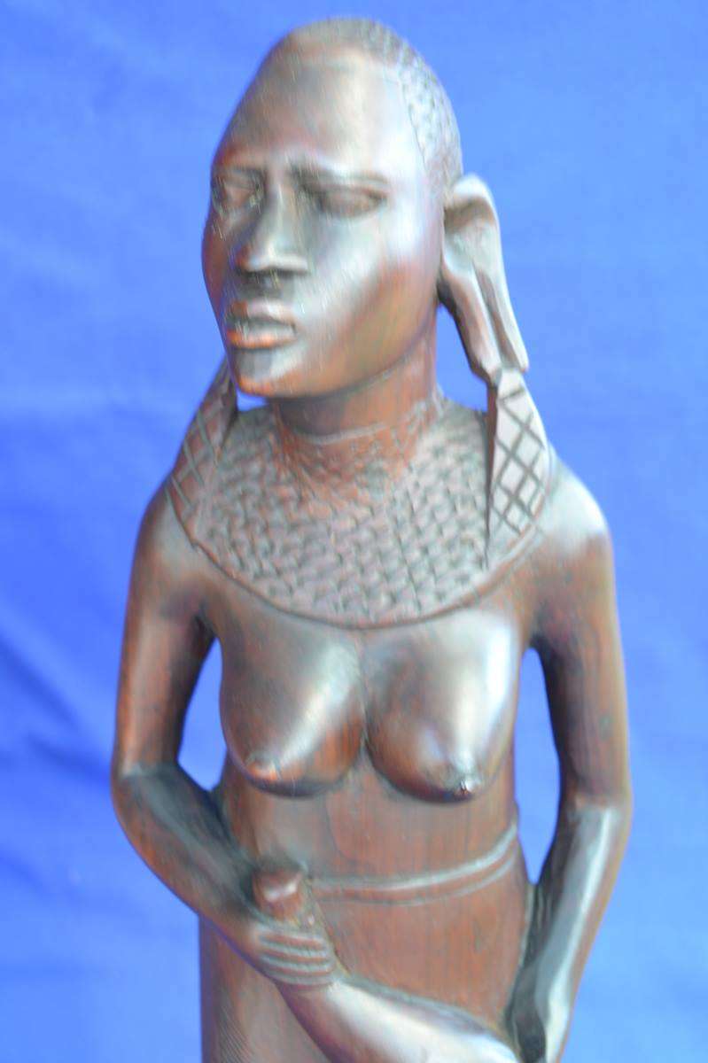 Hand Carved Wooden Maasai Warrior and Tribal  Figures