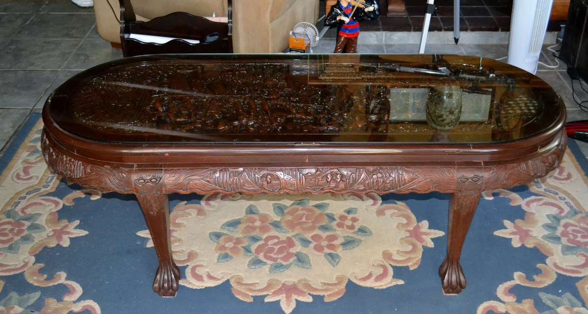 Chinese Oval Coffee Table with Carved Battle Scene