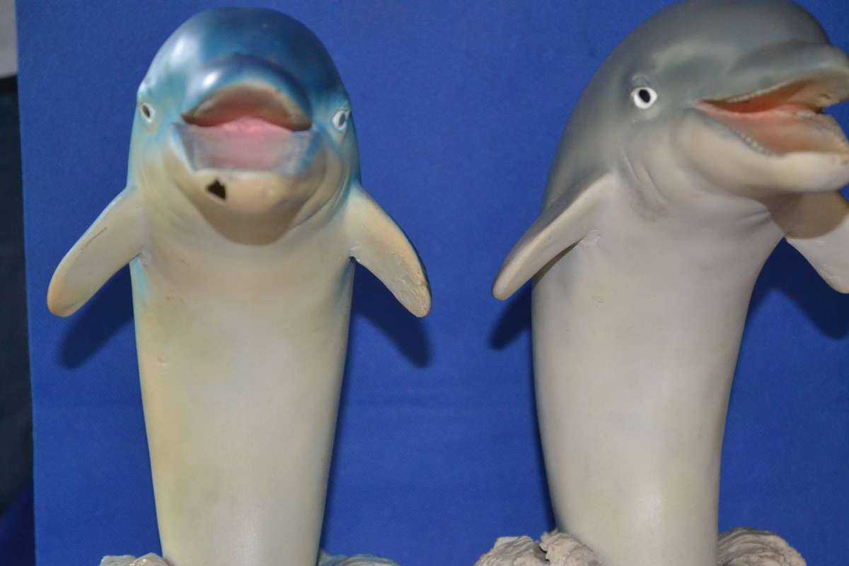 Pair of Large Bottle Nose Dolphins Plus Miniature