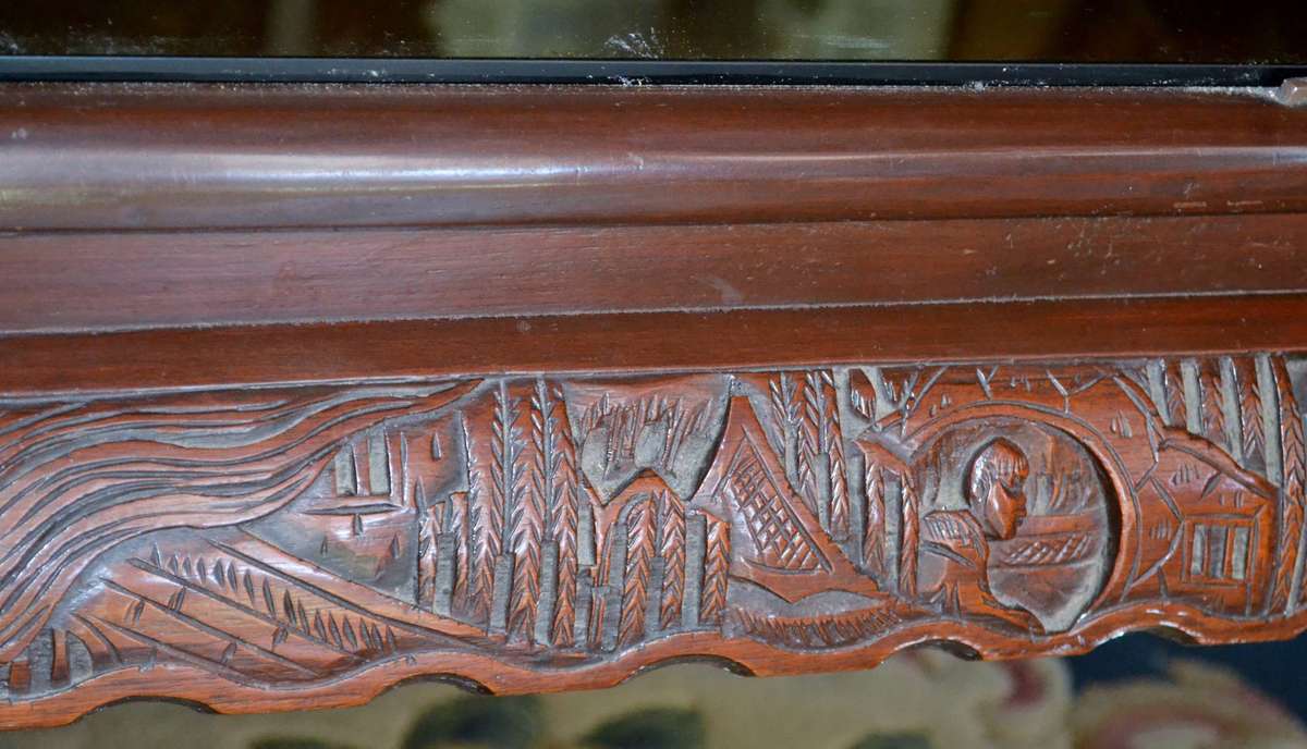 Chinese Oval Coffee Table with Carved Battle Scene