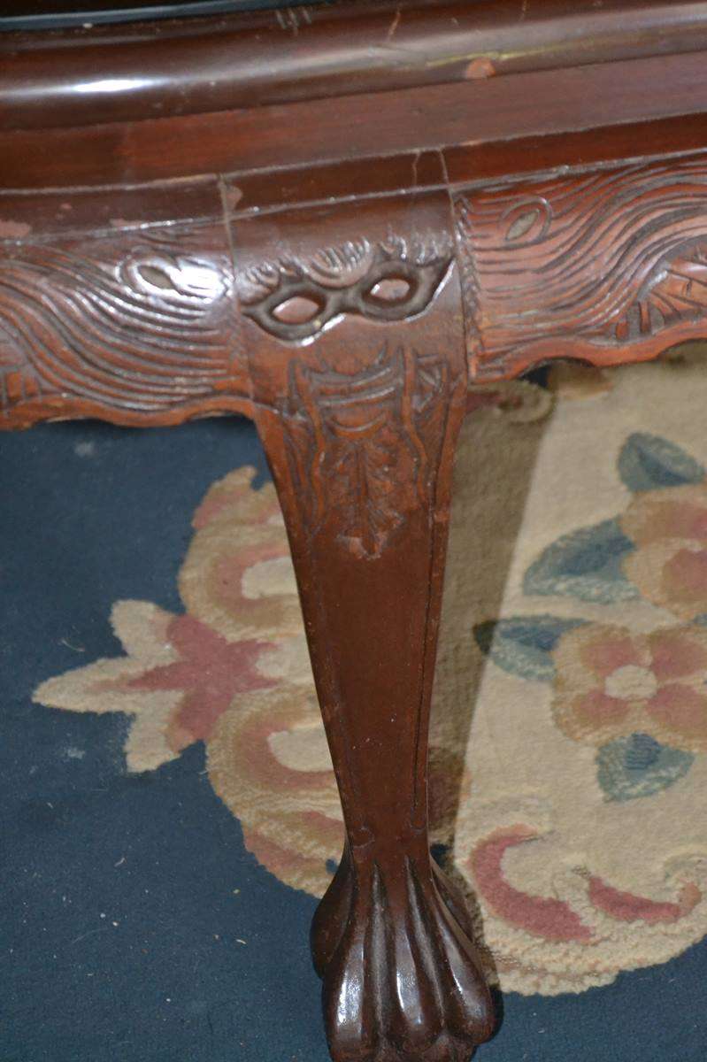 Chinese Oval Coffee Table with Carved Battle Scene