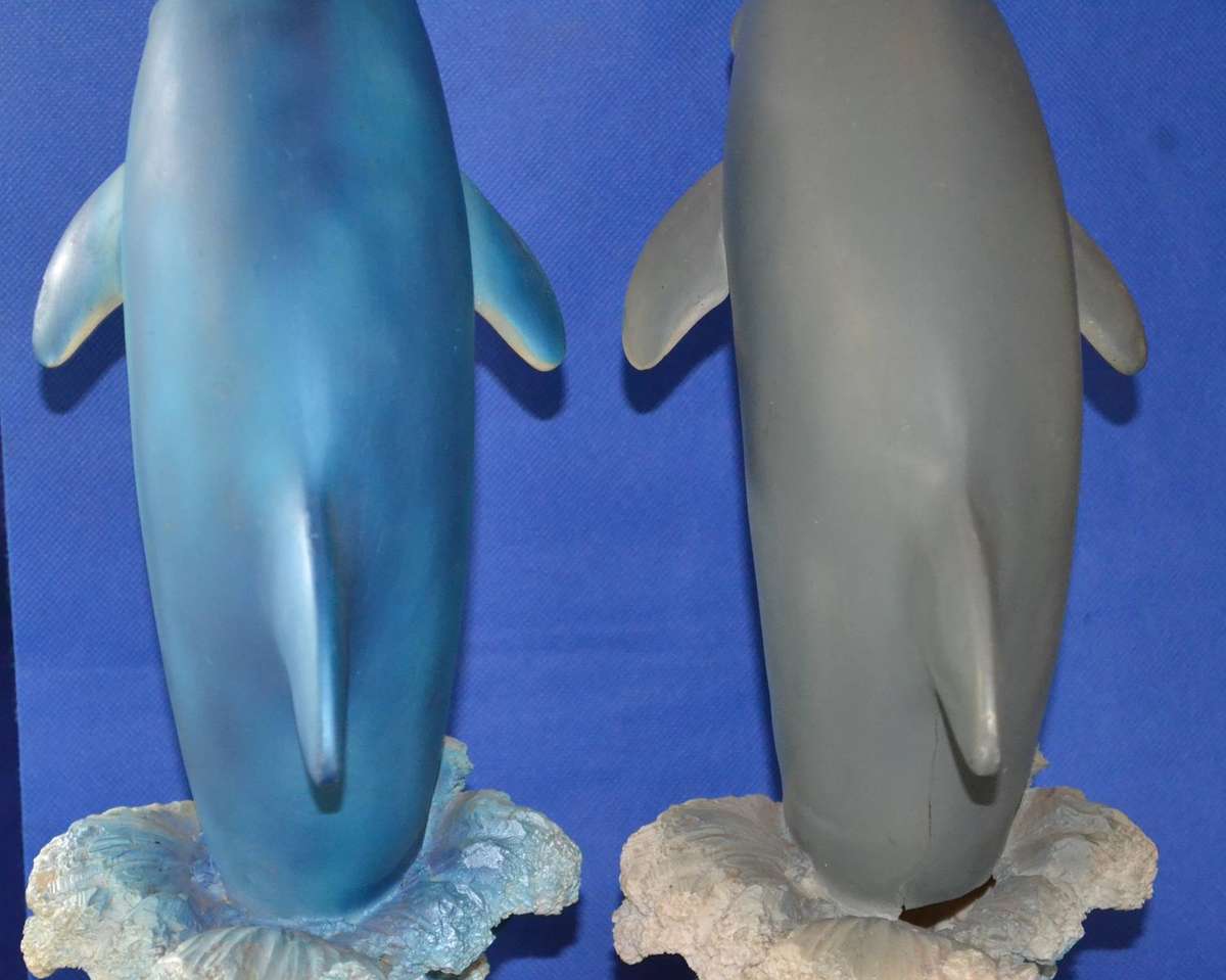 Pair of Large Bottle Nose Dolphins Plus Miniature