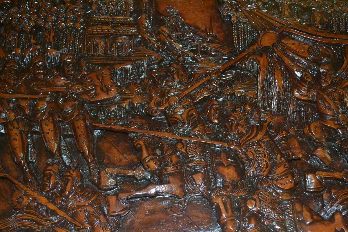 Chinese Oval Coffee Table with Carved Battle Scene