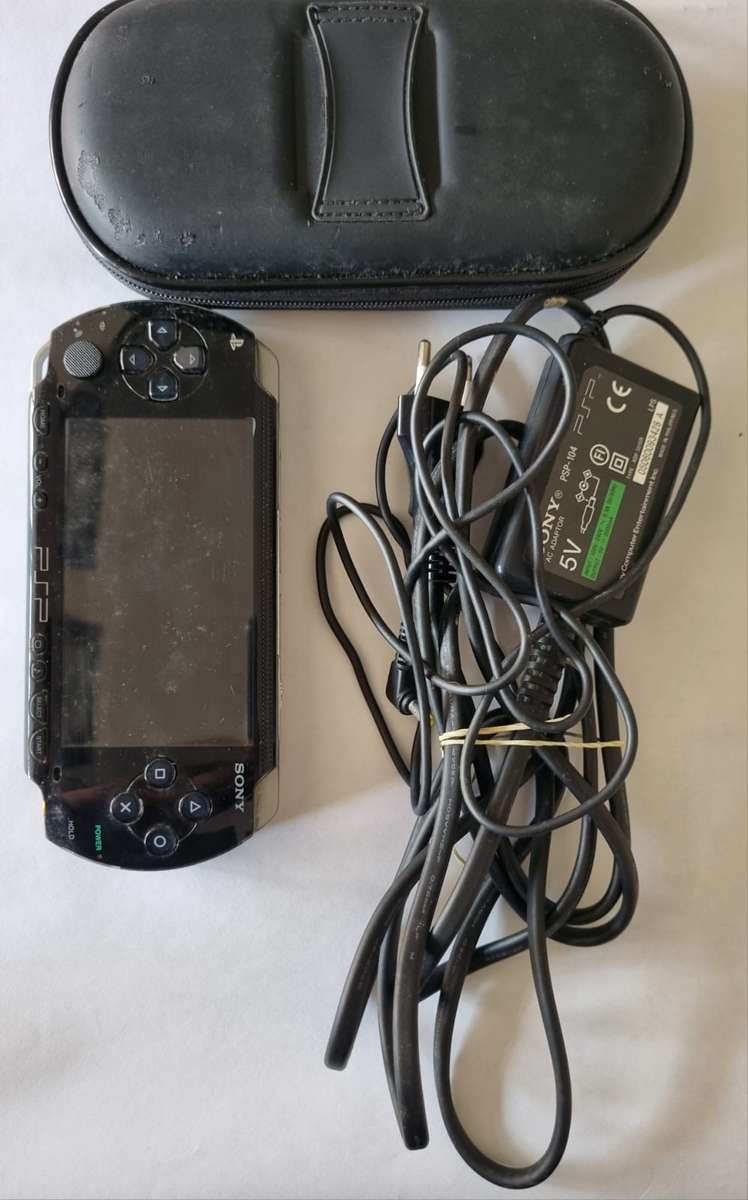 PSP with charger and protective case
