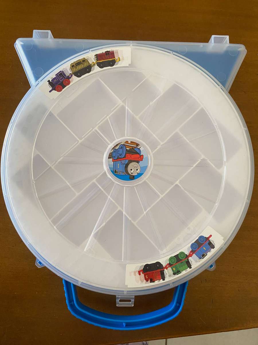 Miniature wind up and wooden Thomas and Friends trains with Thomas inspired storage containers