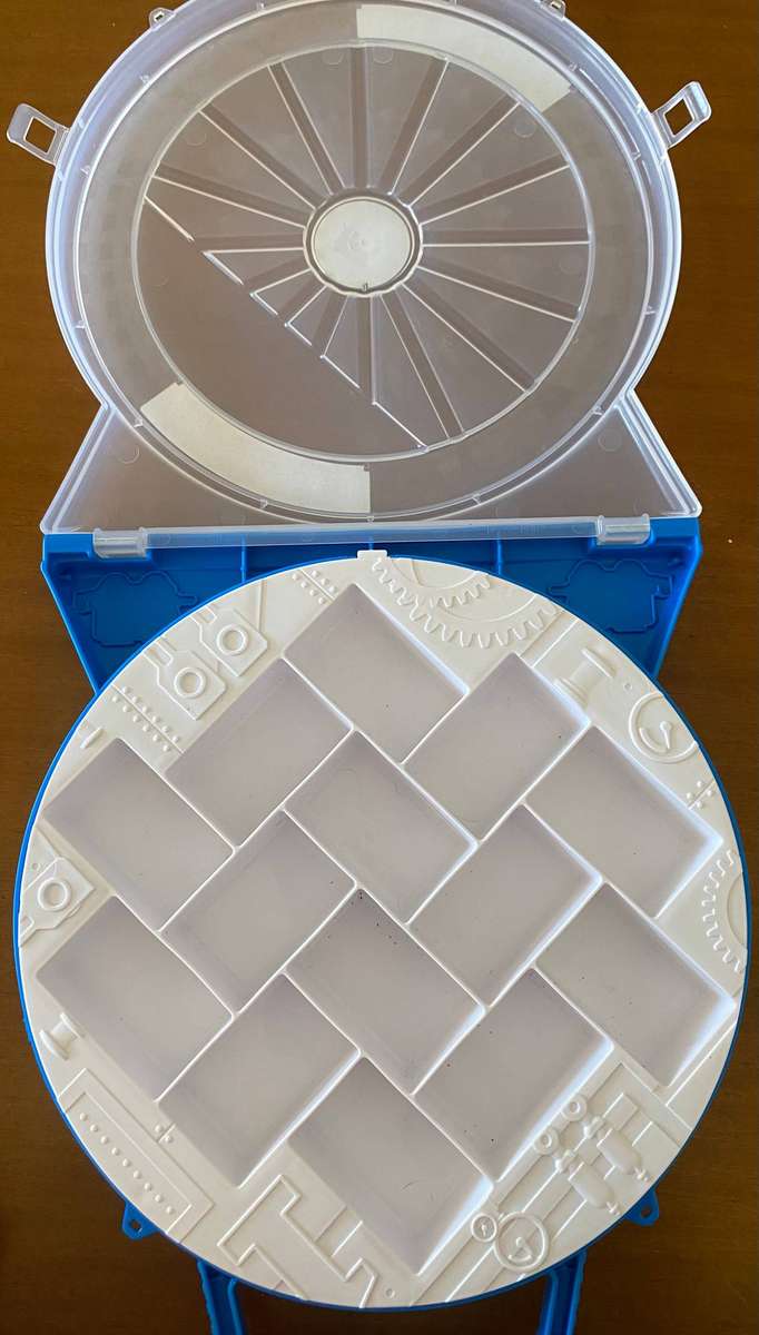 Miniature wind up and wooden Thomas and Friends trains with Thomas inspired storage containers