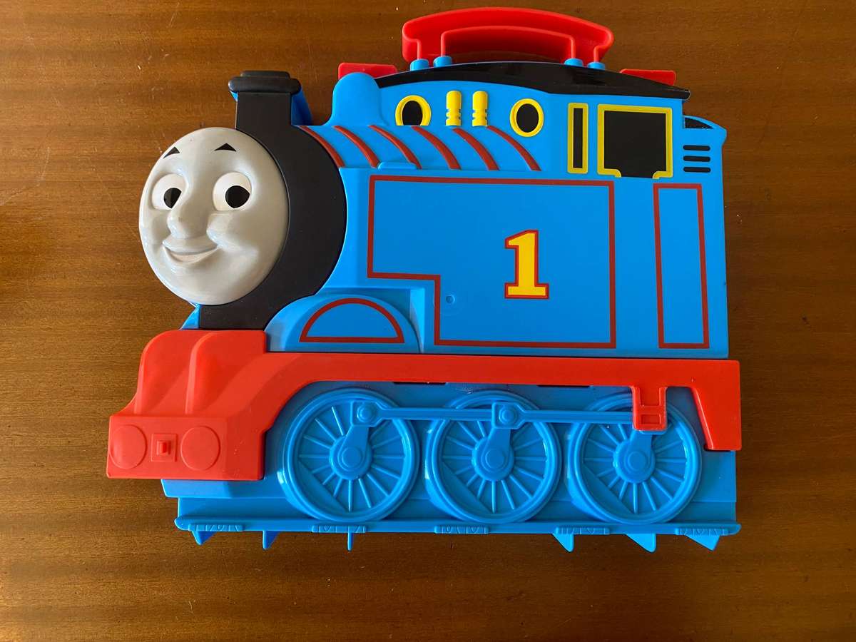 Miniature wind up and wooden Thomas and Friends trains with Thomas inspired storage containers