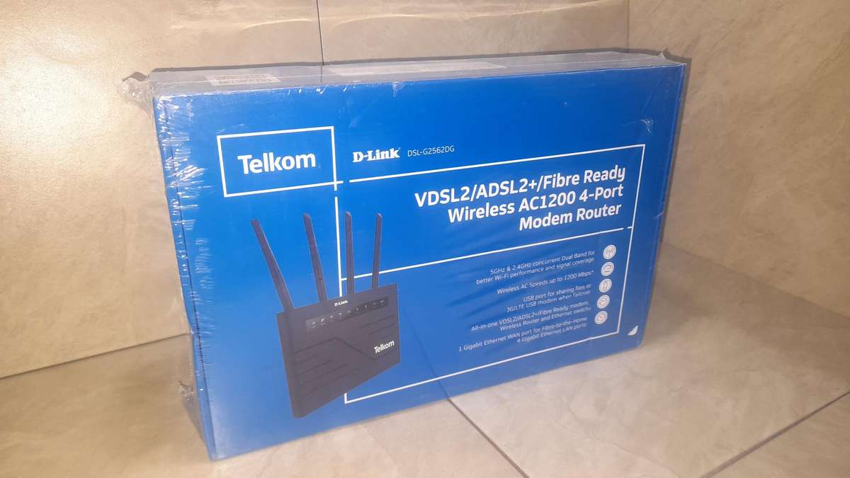 VDSL2/ADSL2+ Wireless AC1200 4-Port Gigabit Modem Router with VOIP