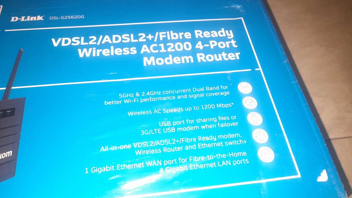 VDSL2/ADSL2+ Wireless AC1200 4-Port Gigabit Modem Router with VOIP