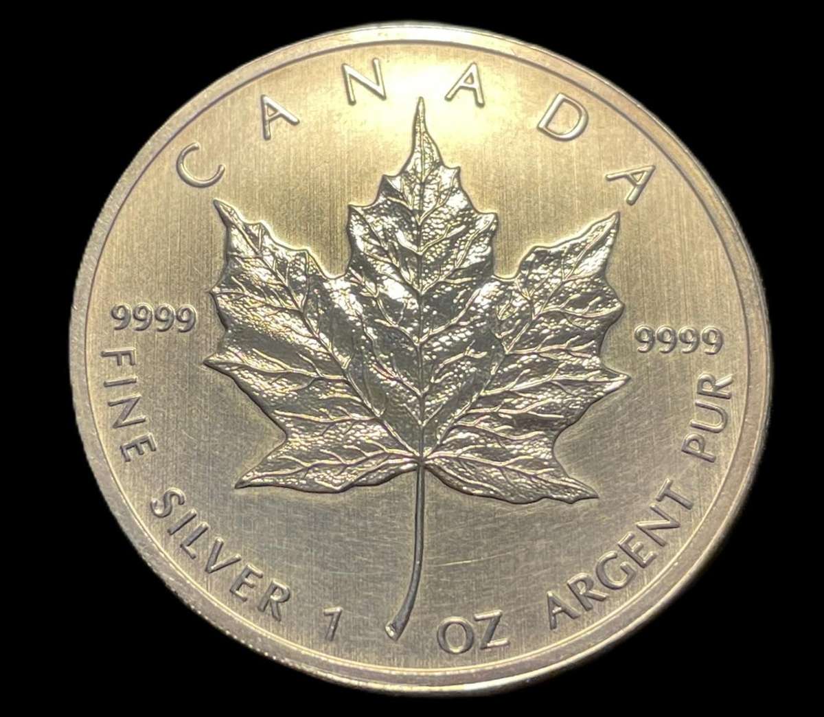 Uncirculated 2011 silver 1 oz Canadian "maple" 5 dollars coin - Current silver value is R648.71