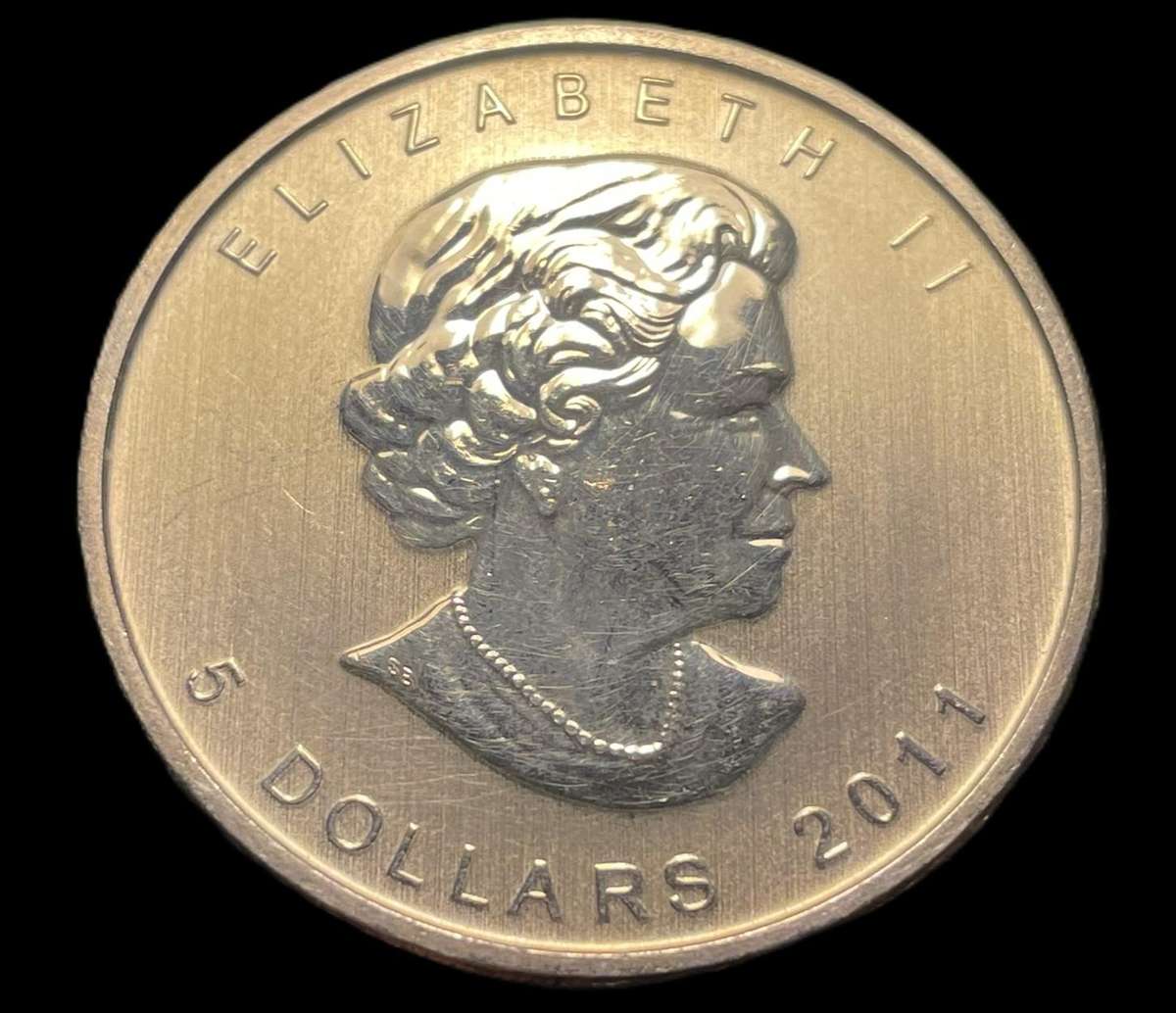 Uncirculated 2011 silver 1 oz Canadian "maple" 5 dollars coin - Current silver value is R648.71
