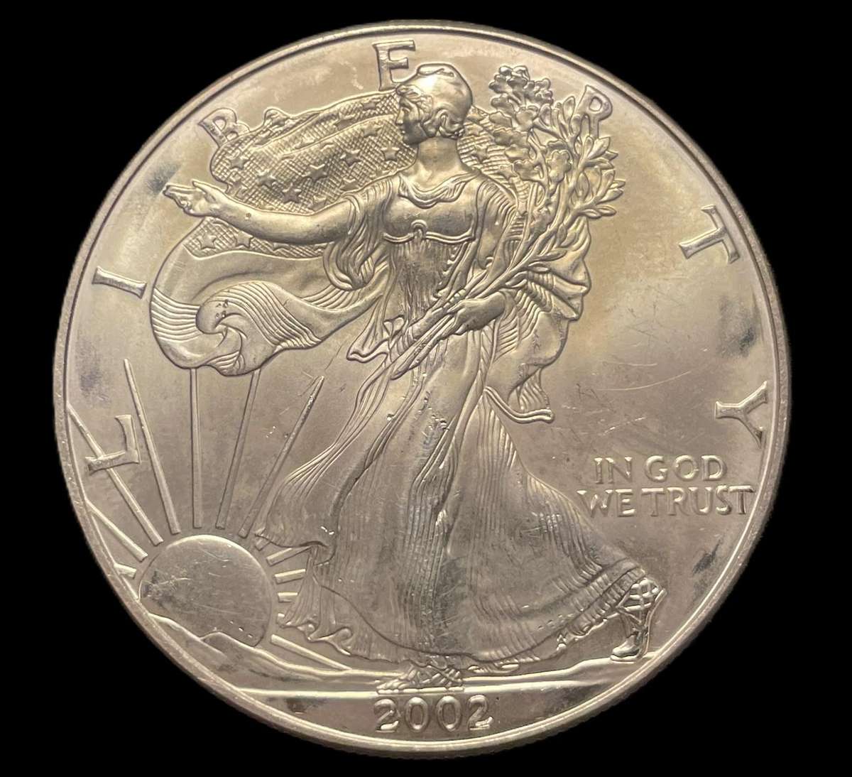 Uncirculated 2002 silver 1 oz USA "Liberty dollar" coin - Current silver value is R648.71