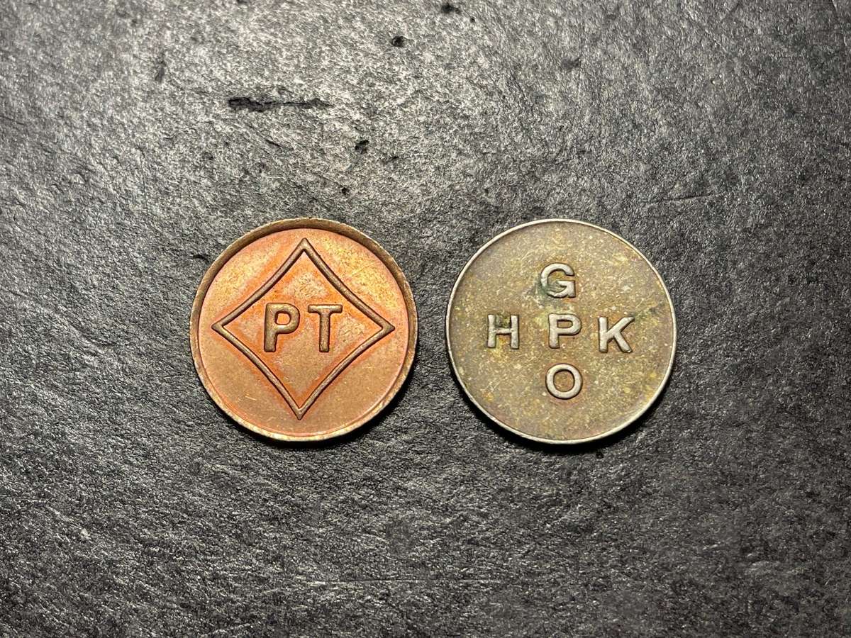 Lot of two vintage post office 5 cent tokens - good condition