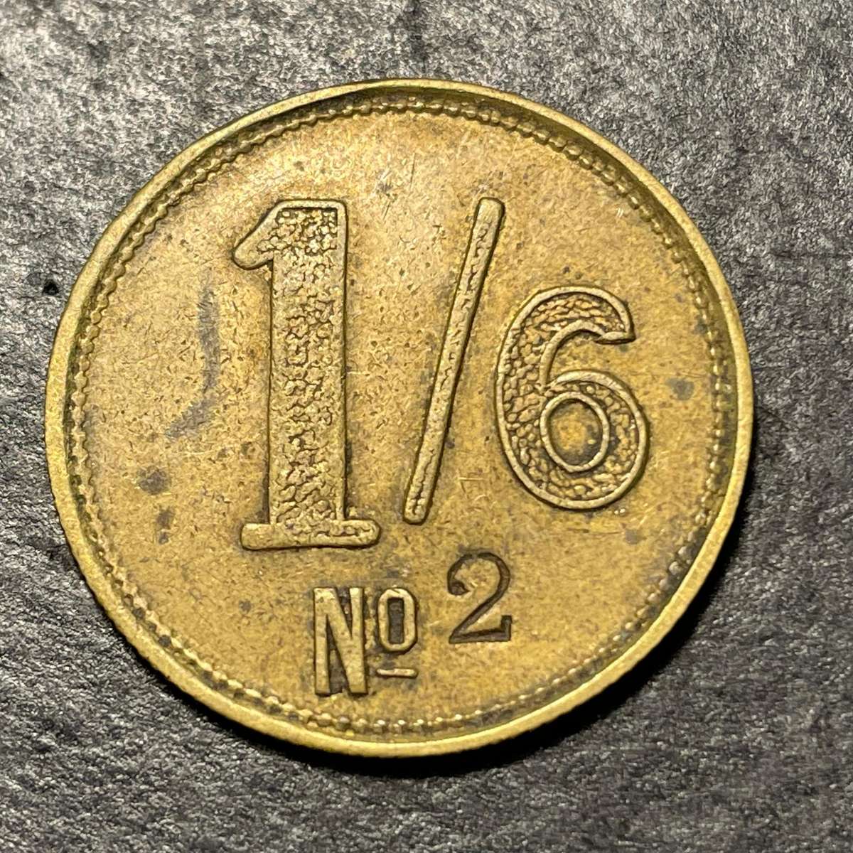 1920s OG & Co South African one and a half shilling brass token - Good condition