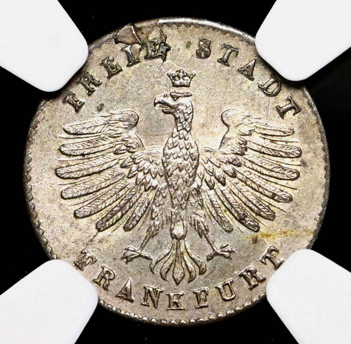 Beautiful silver German cityscape 1k coin graded MS64 by NGC