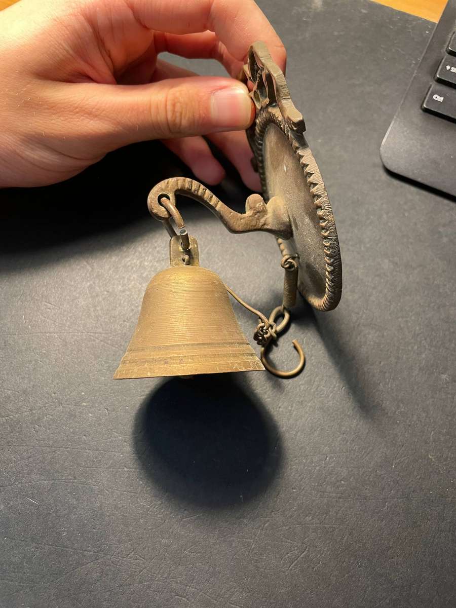 Vintage wall mounted bronze bell