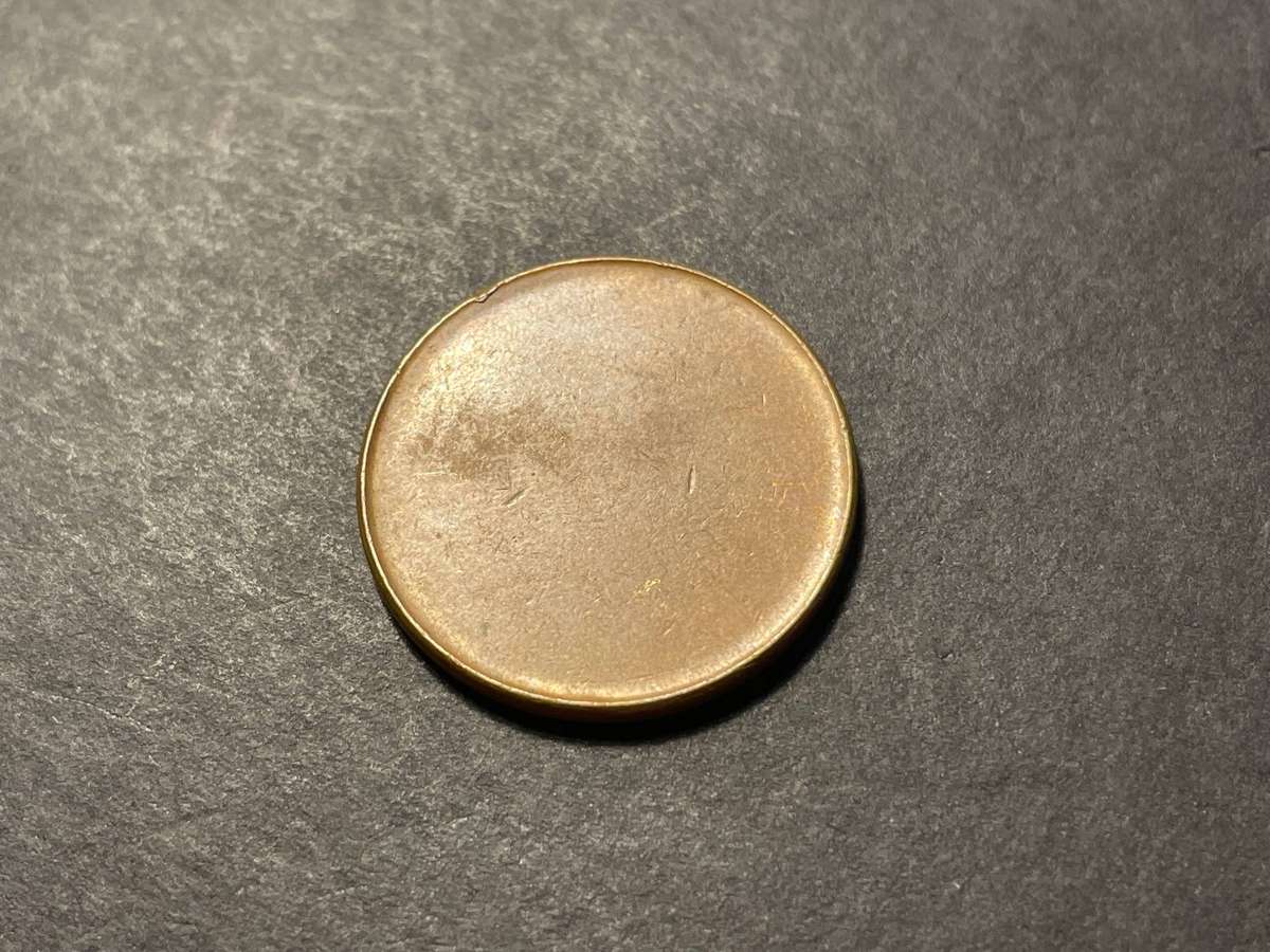 Unidentified blank coinage planchet