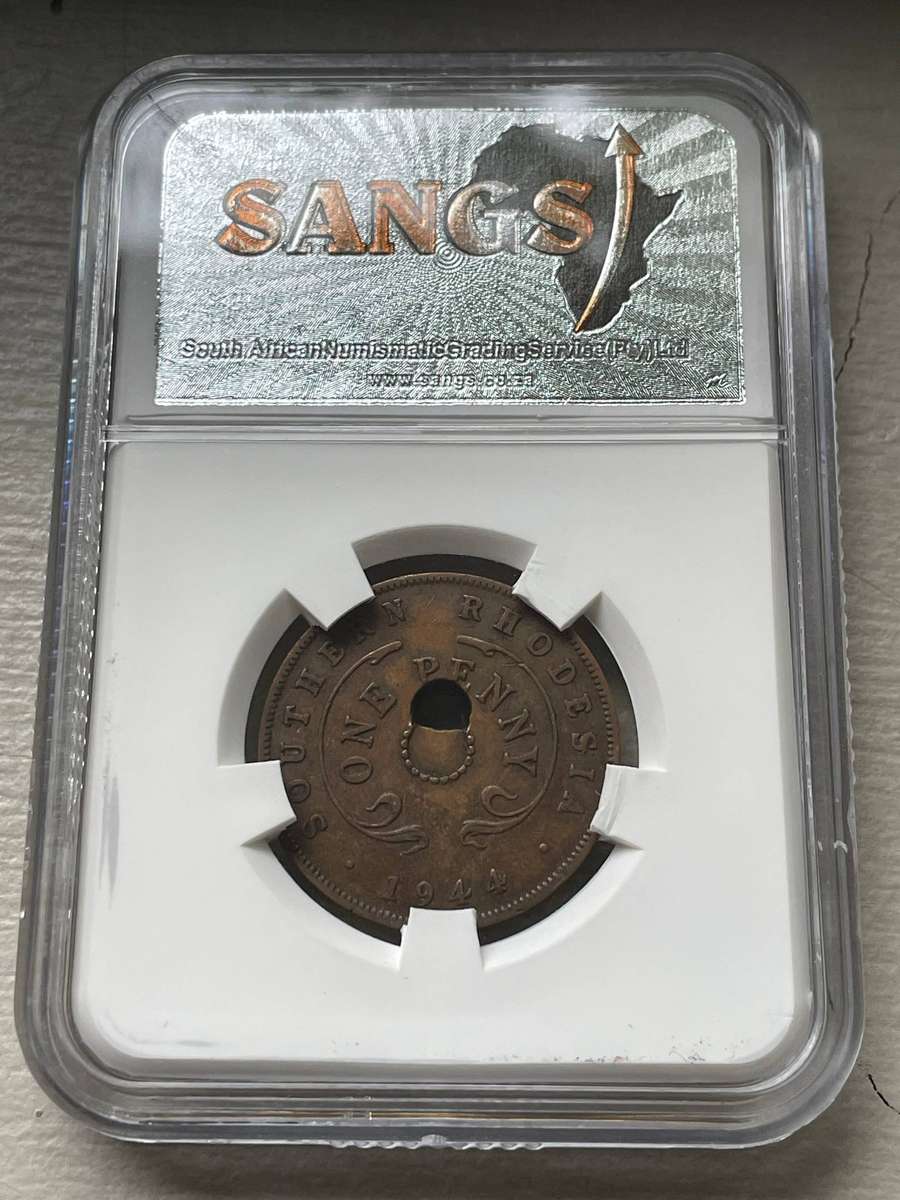 Mint error - Rare 1944 Rhodesian 1 penny coin with an off-centre punch - SANGS graded