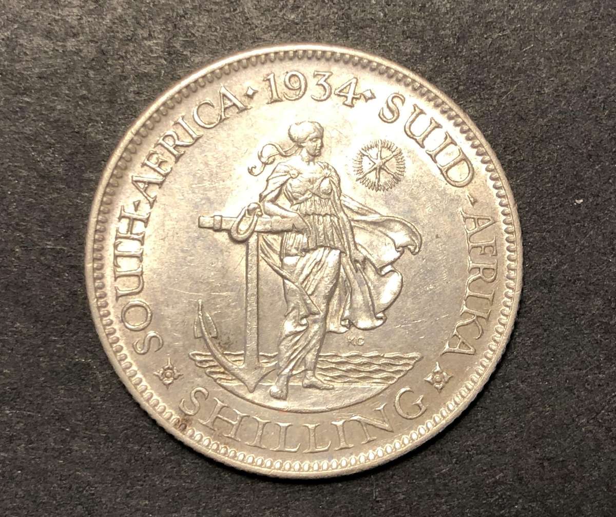 Scarce AU+ 1934 SA Union silver shilling coin - High catalogue value of R3000 in AU & R10,000 in UNC