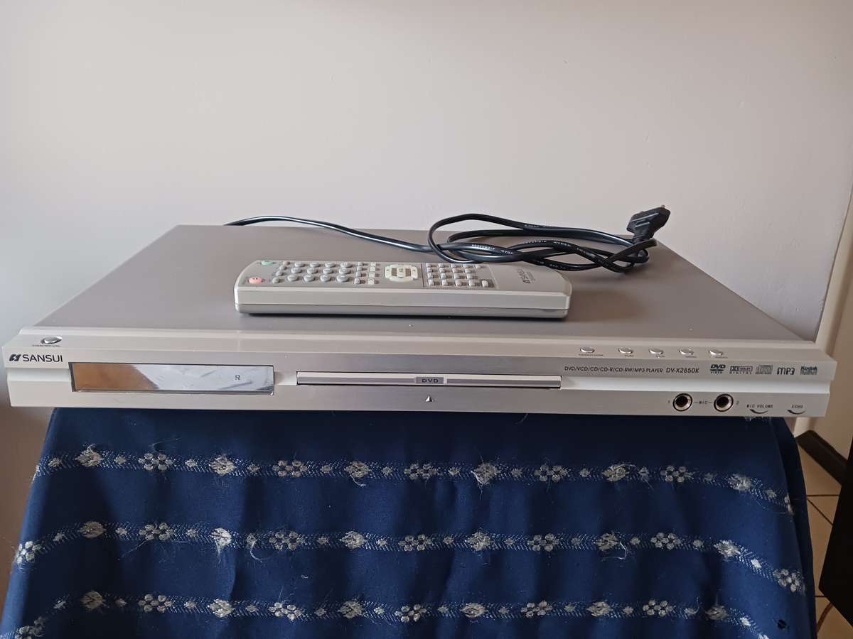 Sansui -  DVD / CD Player model DV-X 2850K,with remote and 6 movies