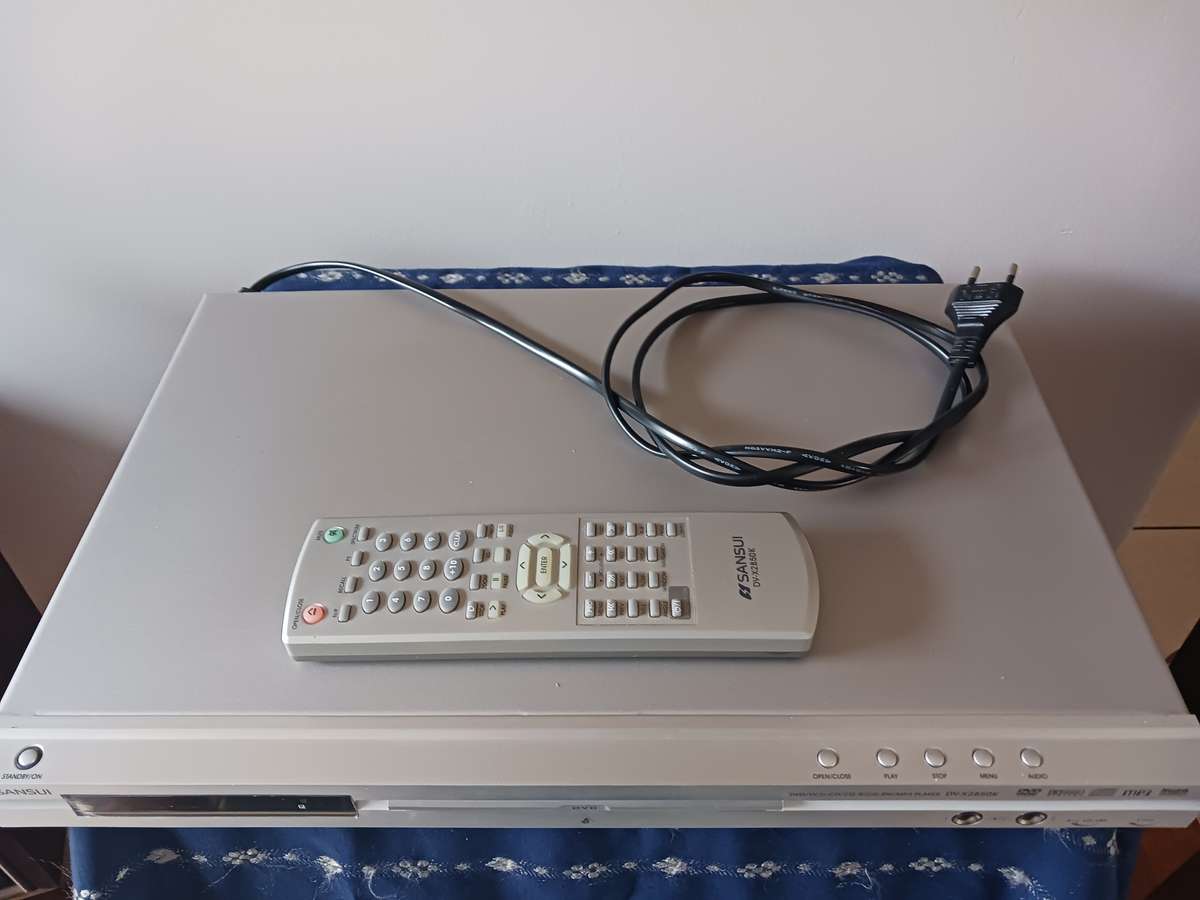 Sansui -  DVD / CD Player model DV-X 2850K,with remote and 6 movies