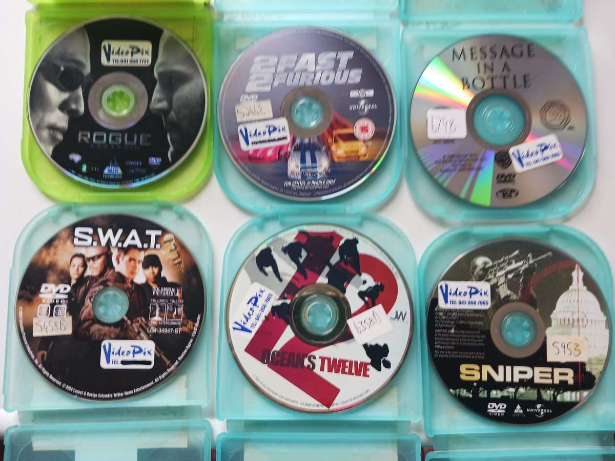 Sansui -  DVD / CD Player model DV-X 2850K,with remote and 6 movies