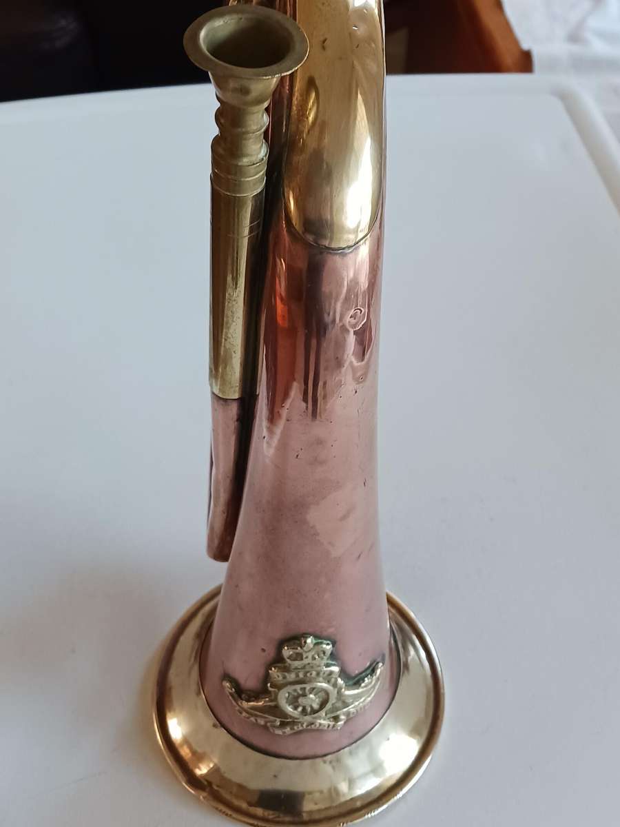 Military Copper and brass Bugle,with military badge and wool cord.