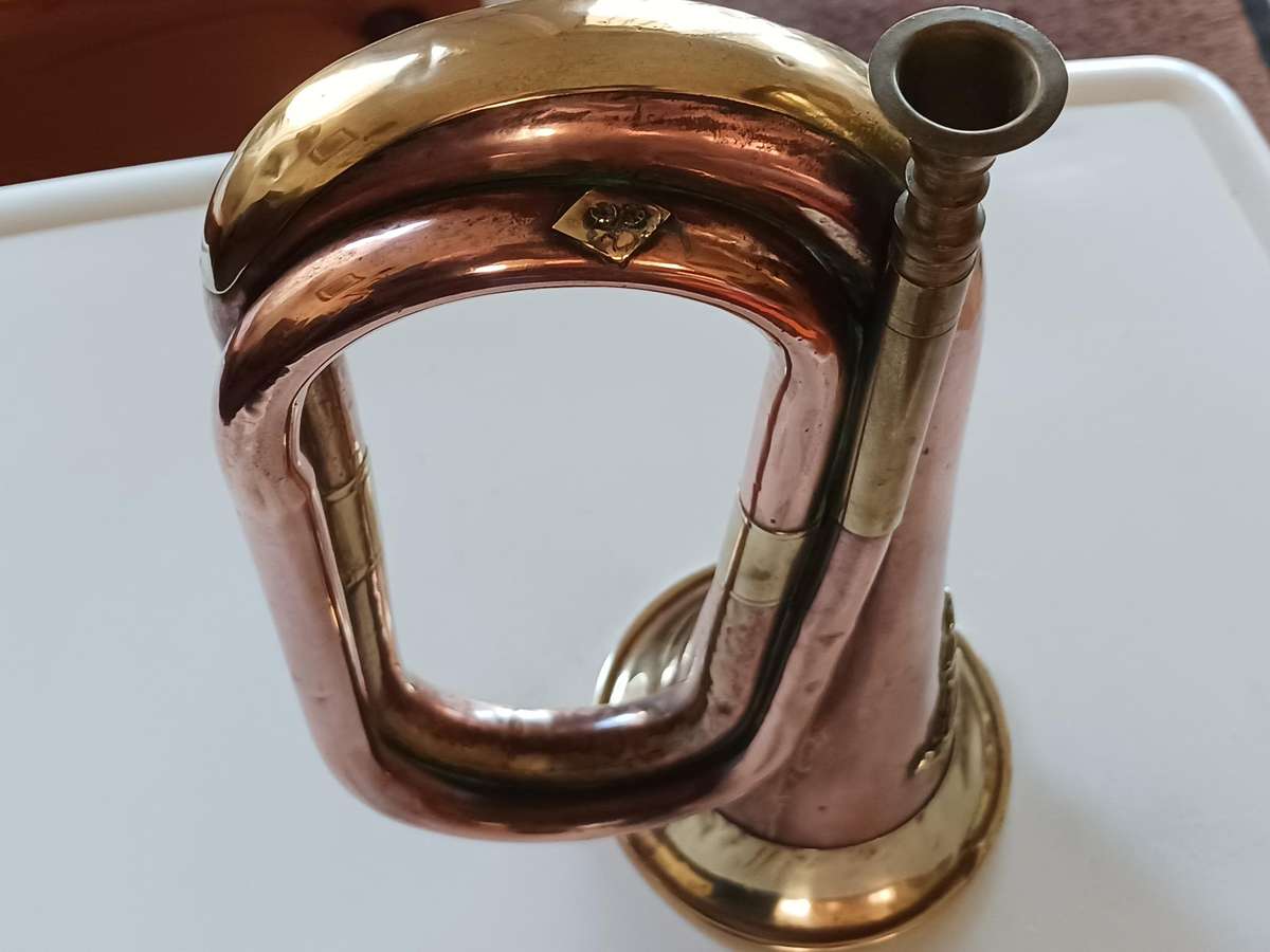Military Copper and brass Bugle,with military badge and wool cord.
