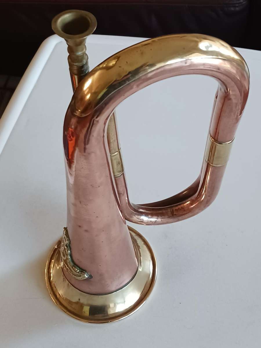 Military Copper and brass Bugle,with military badge and wool cord.