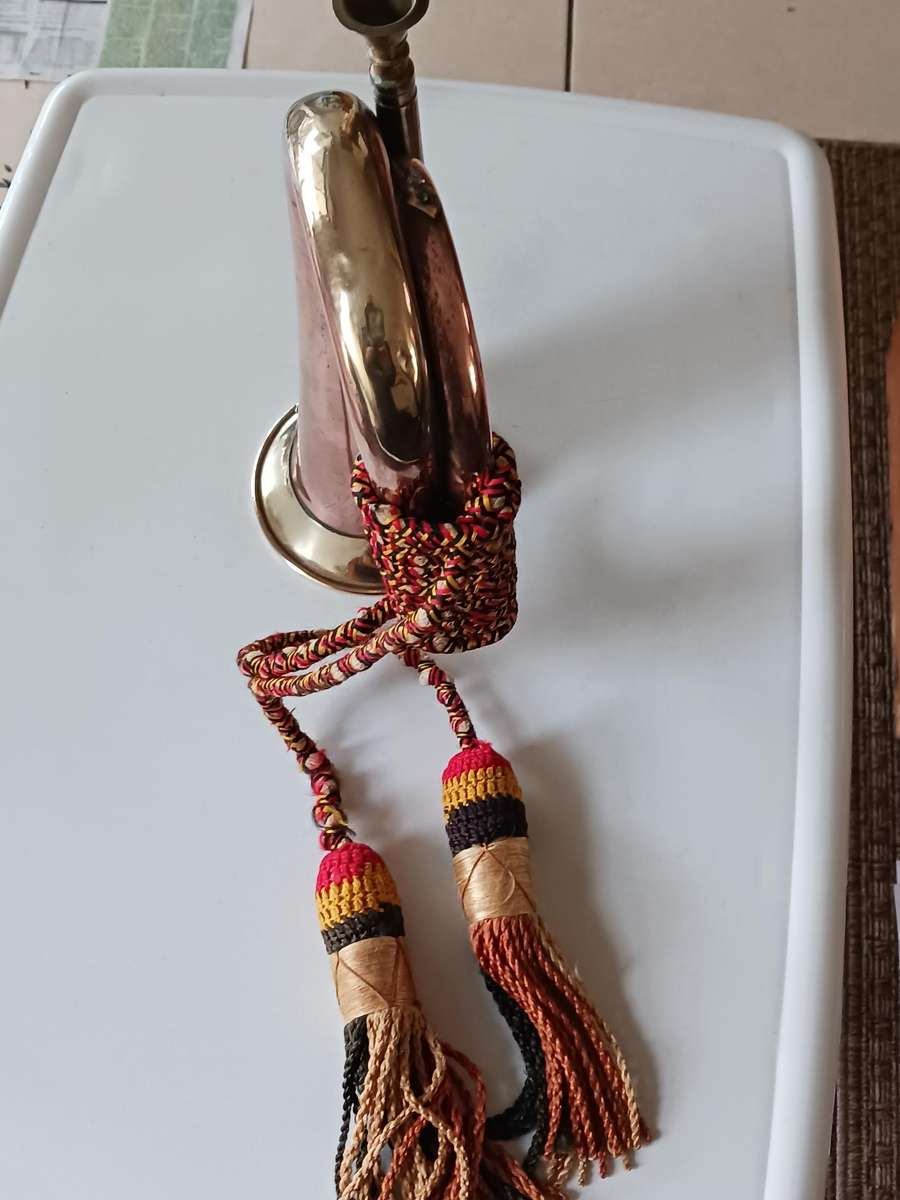 Military Copper and brass Bugle,with military badge and wool cord.