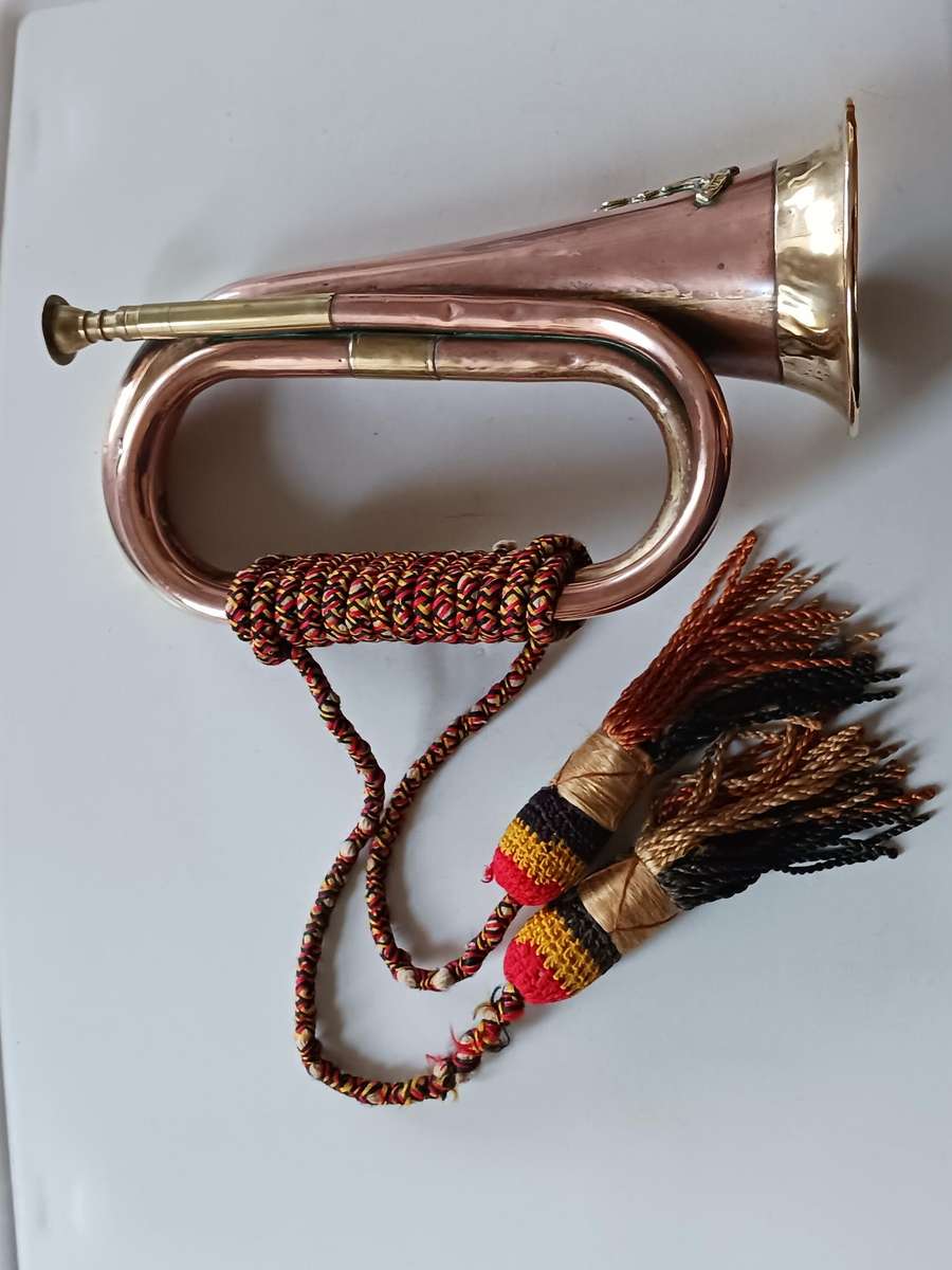 Military Copper and brass Bugle,with military badge and wool cord.