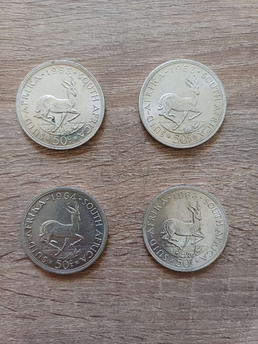 4 X 50c coins. 50% silver