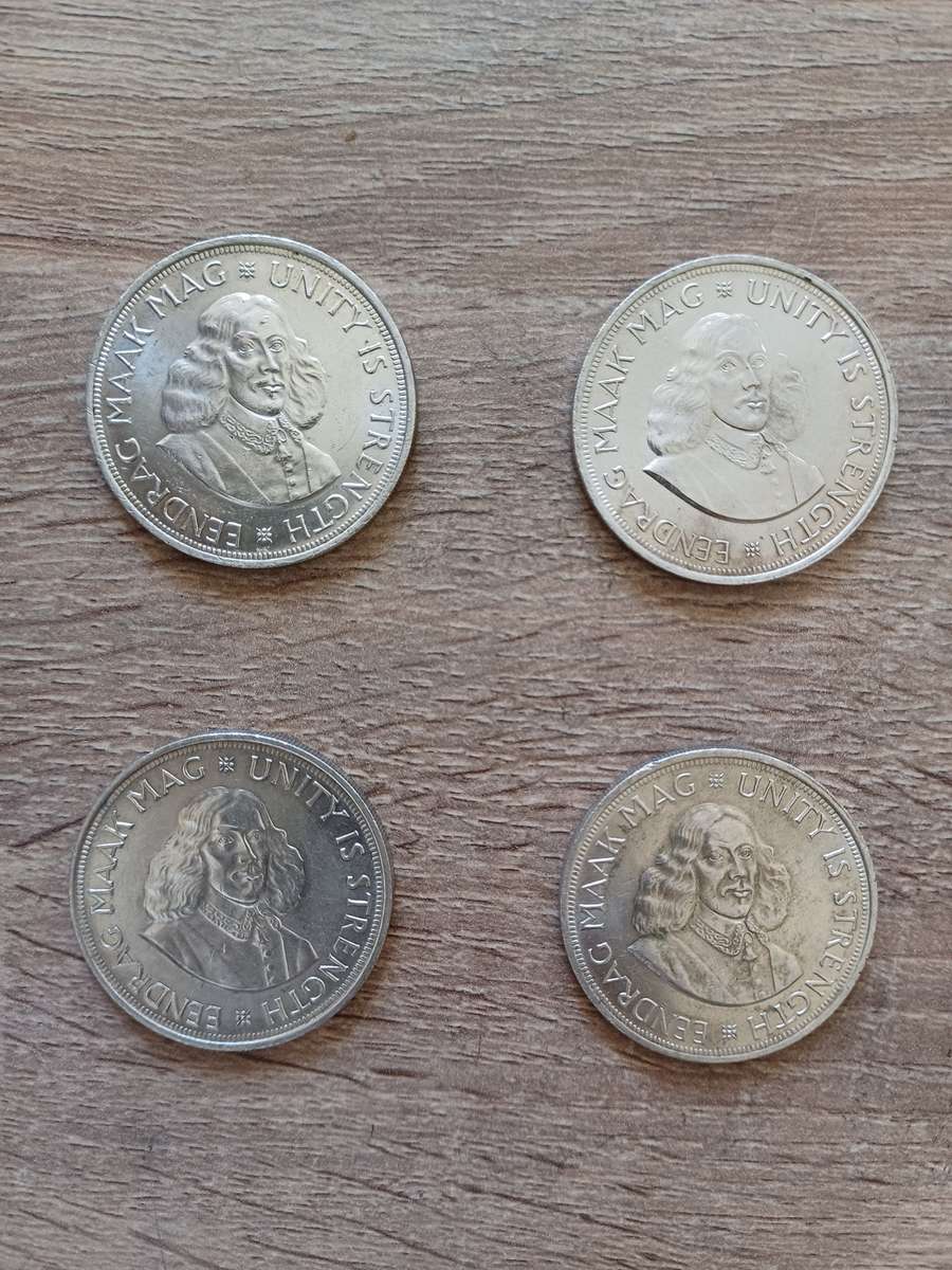 4 X 50c coins. 50% silver