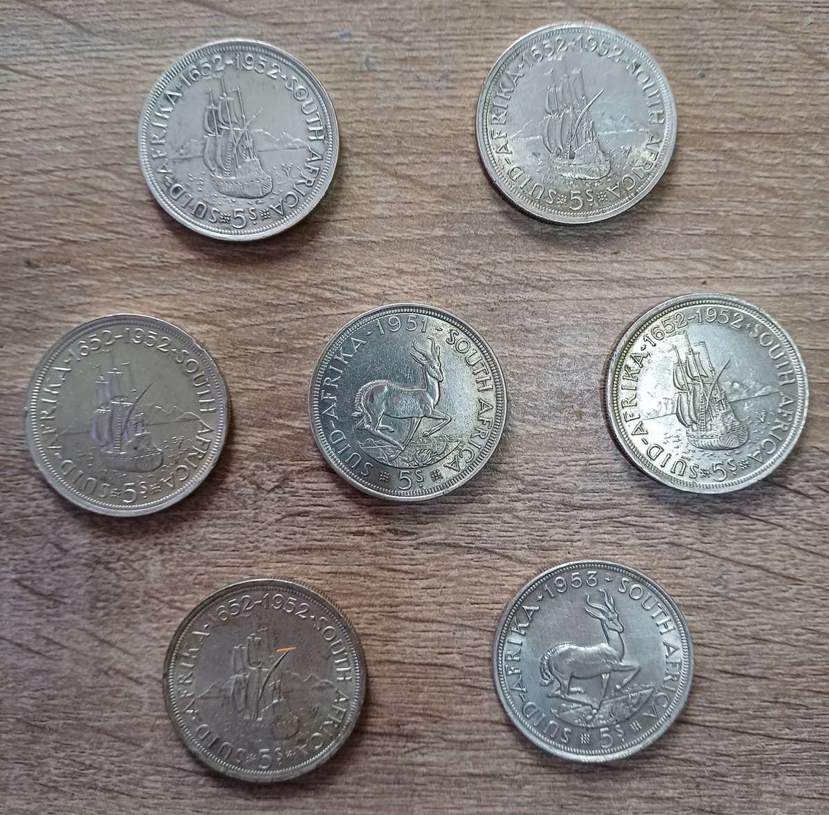 5 shillings 50% silver. 7 available - bid per coin to take all.