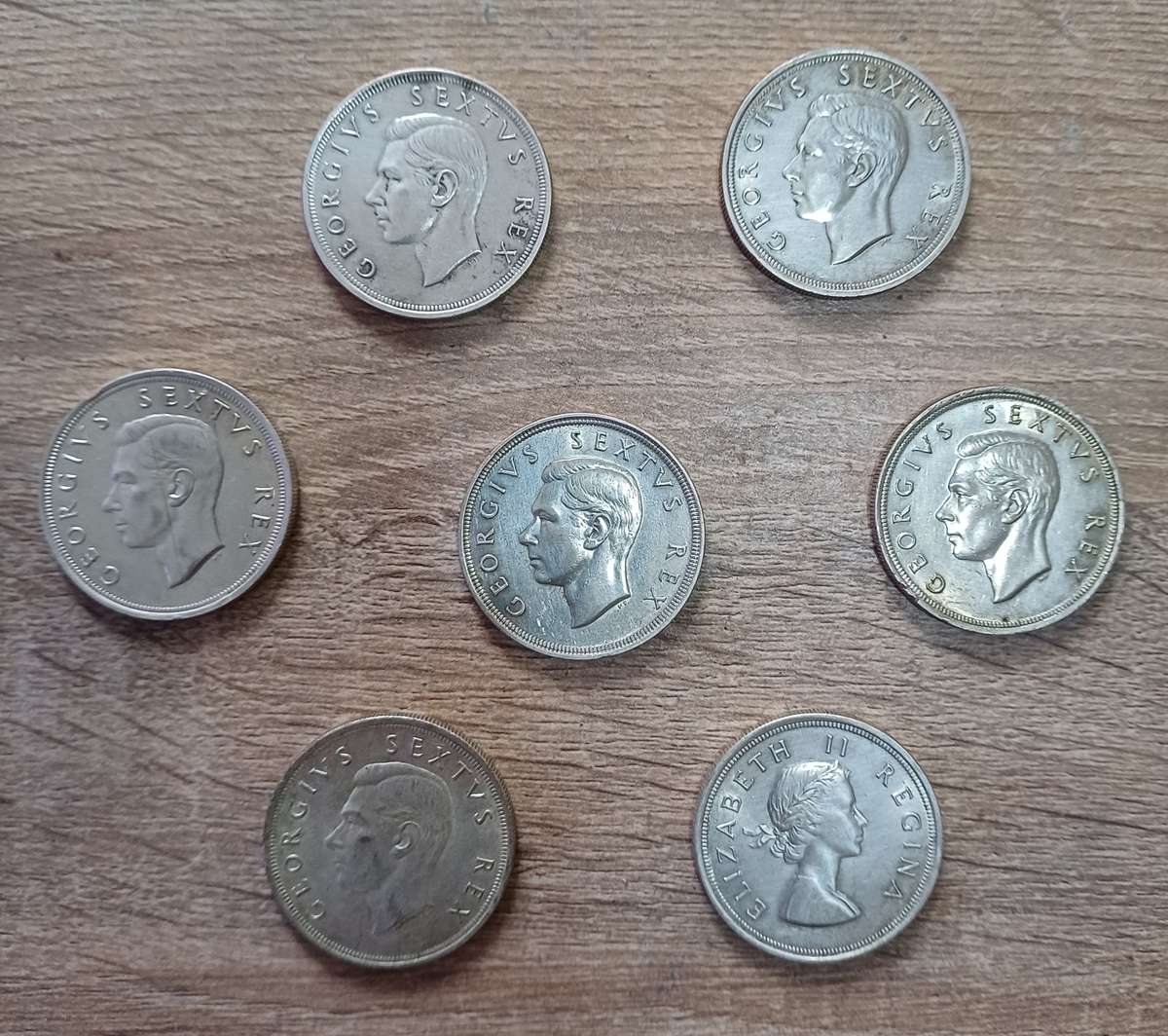5 shillings 50% silver. 7 available - bid per coin to take all.