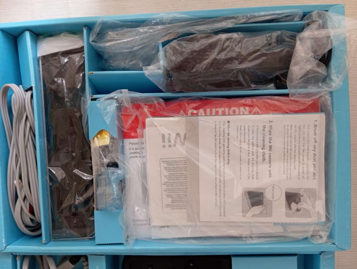 boxed wii console with wii sports and sports resort bundle