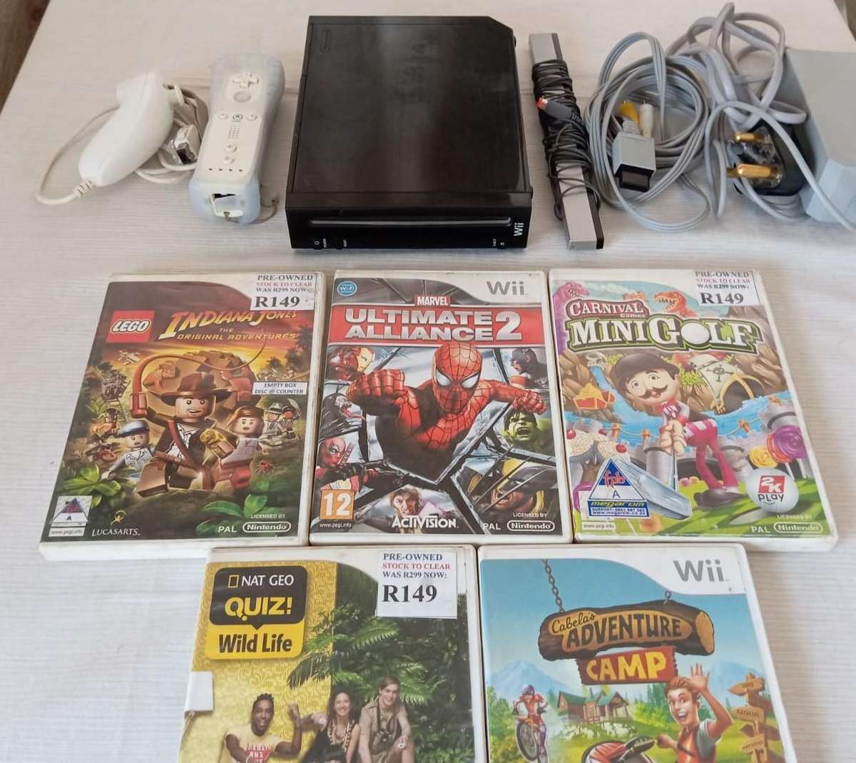 wii console complete with 5 games