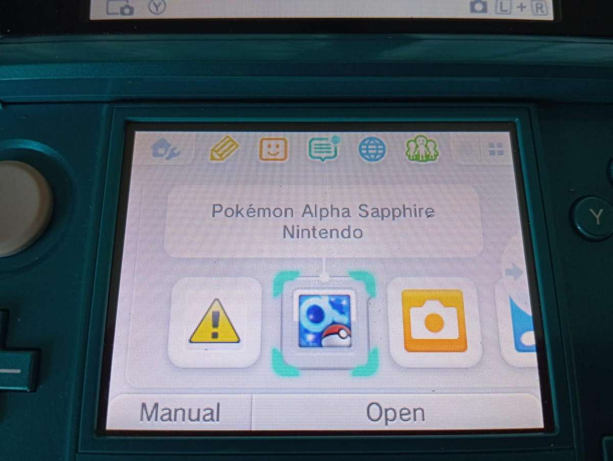 Nintendo 3ds console with original charger and memory card / stylus