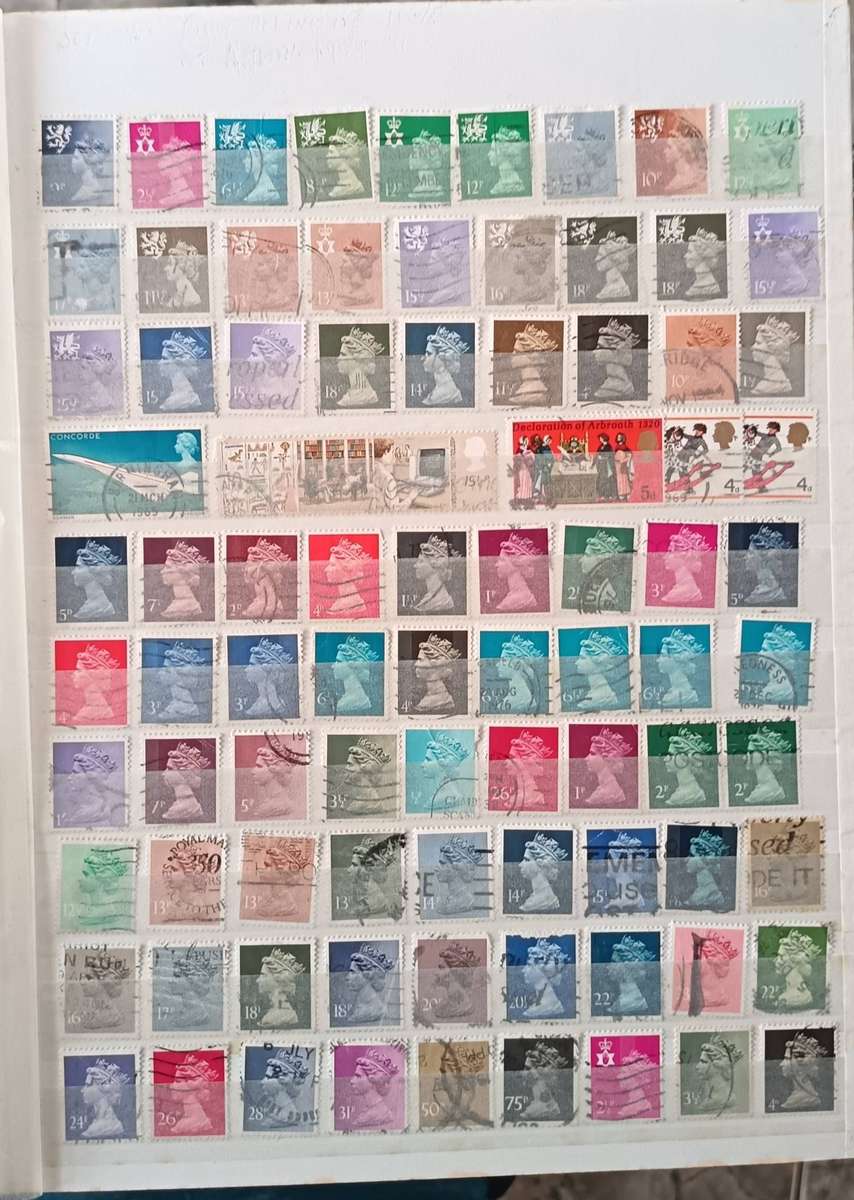 MIXED LOT OF WORLD STAMPS IN ALBUM