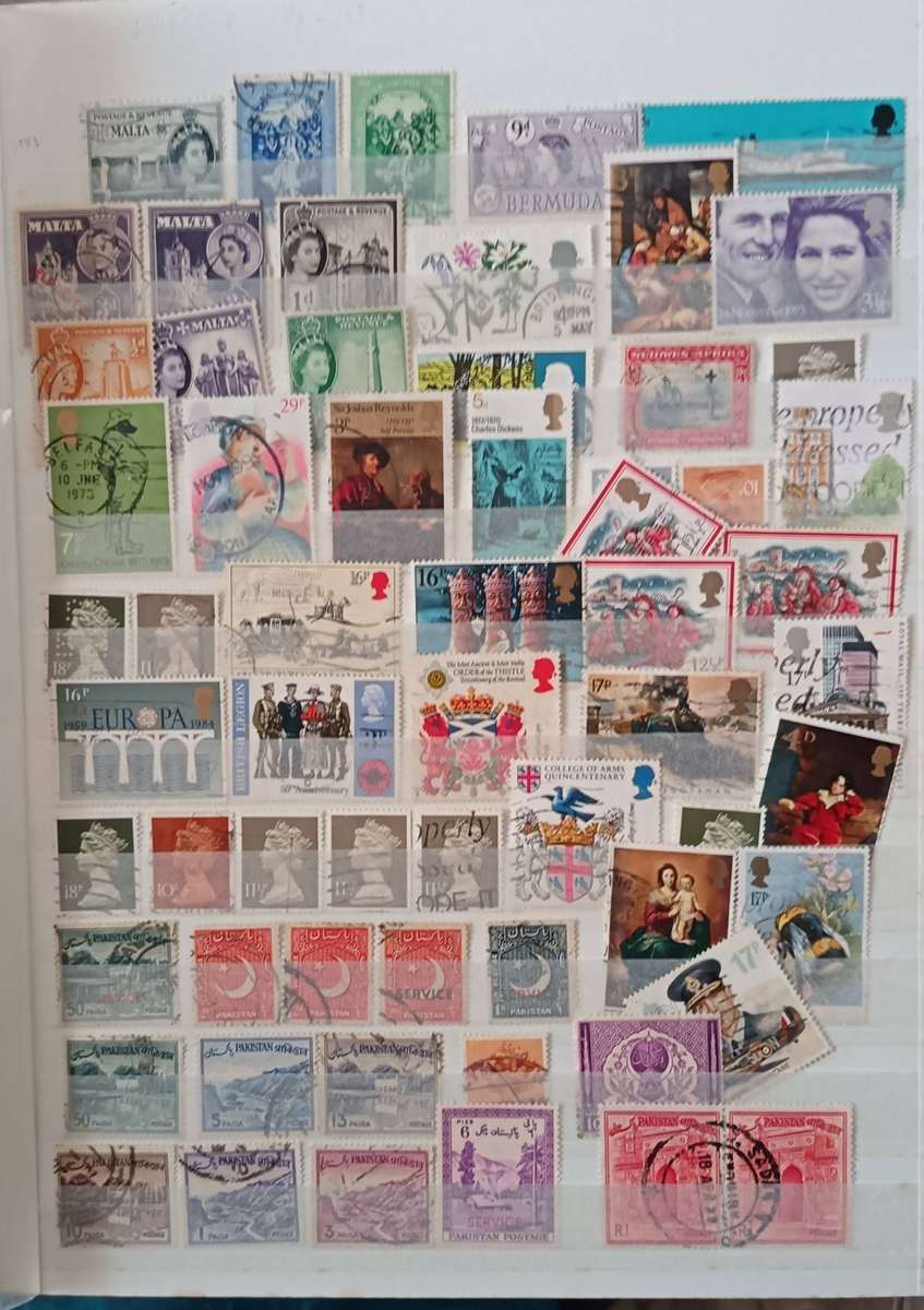 MIXED LOT OF WORLD STAMPS IN ALBUM