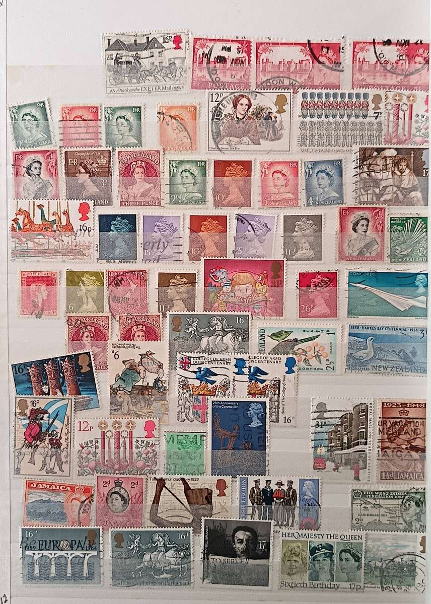 MIXED LOT OF WORLD STAMPS IN ALBUM