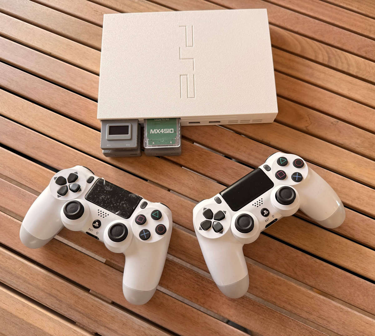 Ice White 'drive-less' PlayStation 2 Restomod with 2 X Brand New Dualshock 4 Controllers