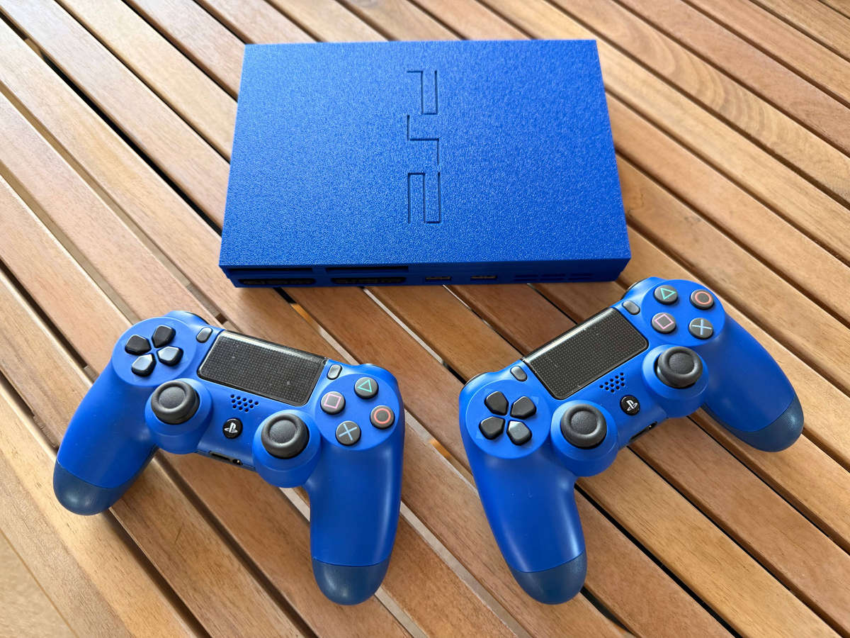 Royal Blue 'drive-less' PlayStation 2 Restomod with 2 x Brand New DualShock 4 Controllers
