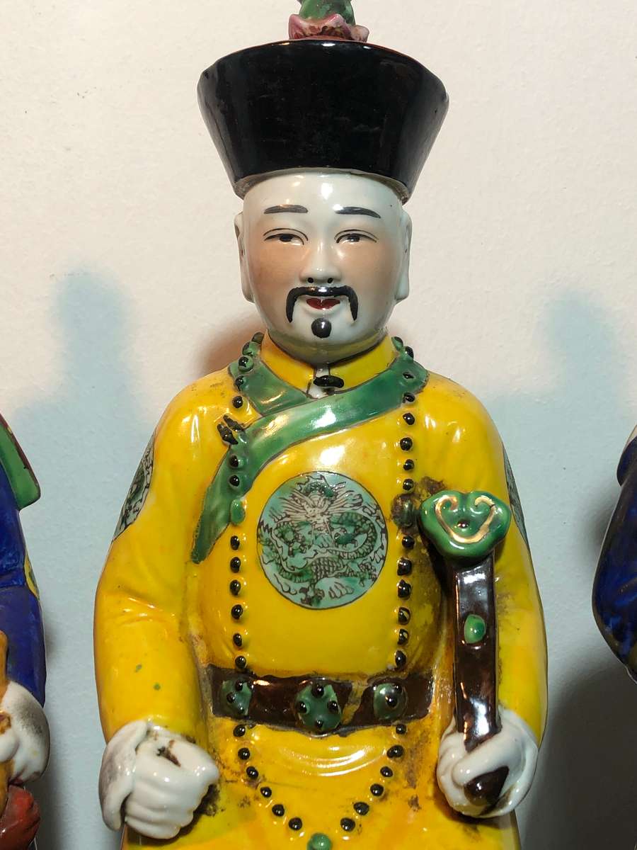 A Trio of Chinese Emperor Porcelain Statues