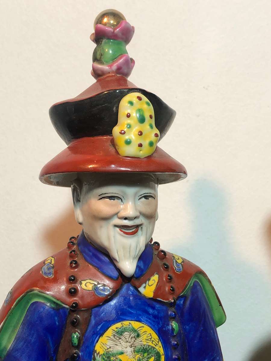 A Trio of Chinese Emperor Porcelain Statues