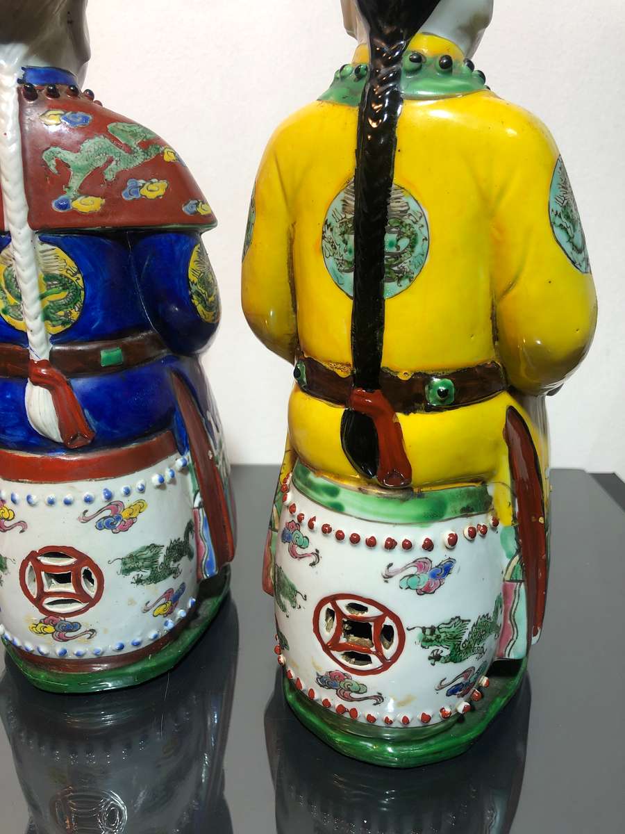A Trio of Chinese Emperor Porcelain Statues
