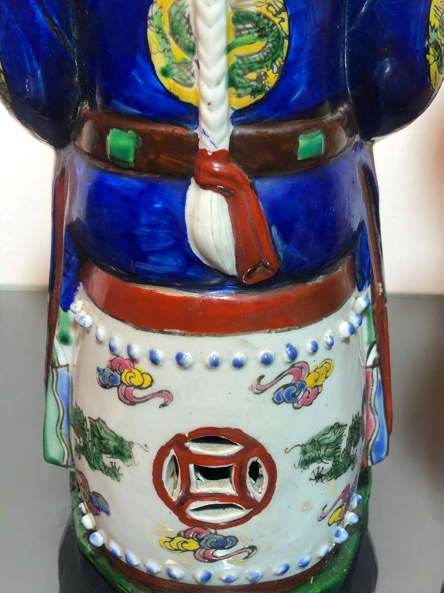 A Trio of Chinese Emperor Porcelain Statues