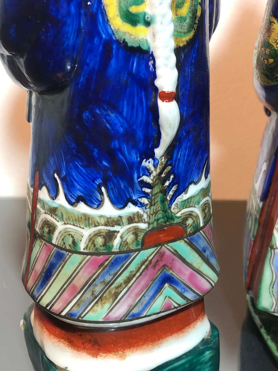 A Trio of Chinese Emperor Porcelain Statues